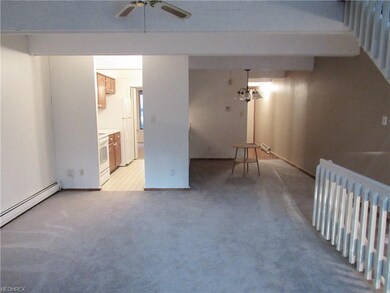 View from the fireplace into kitchen and dining