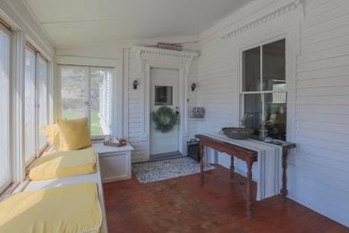 45SandyPointRdSunroomLivingRoomDoorStock