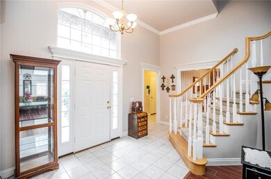 Beautiful Staircase to bedroom 2-3, full bath and bonus room