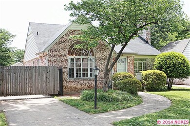 An electric gate offers driveway privacy.