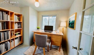 Carpeted office featuring a textured ceiling : Vir