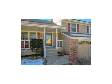 Front entry is covered and has a strom door.