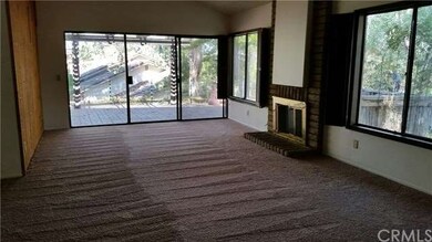 Living room with sliders to Patio