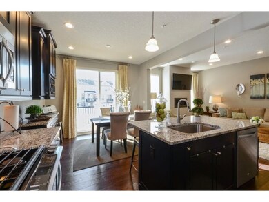 Pull up a bar stool to the center island or gather