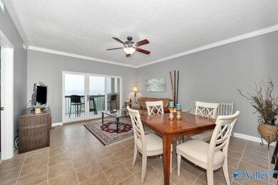 Tile flooring, Crown molding, ceiling fan, 9' ceiling, wet bar with ice maker
