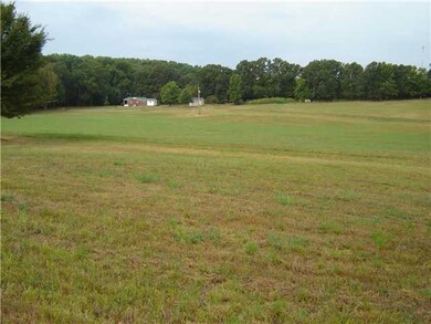 VIEW OF THE HOUSE FROM THE BARN