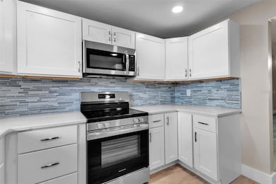THE APPLIANCES HAVE MANUALS AND WARRANTIES WAITING TO BE FILLED OUT.