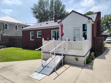 Back of house with a patio area
