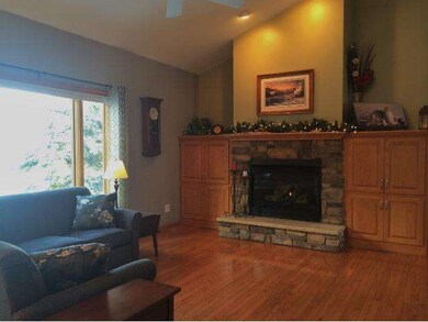 The gas fireplace is the focal point in this spaci