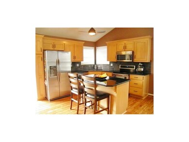 Kitchen with beautiful granite counter tops.