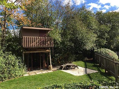 Backyard. Darling play house for the children ador