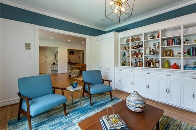 Wonderful wood-panelled study with built-ins.