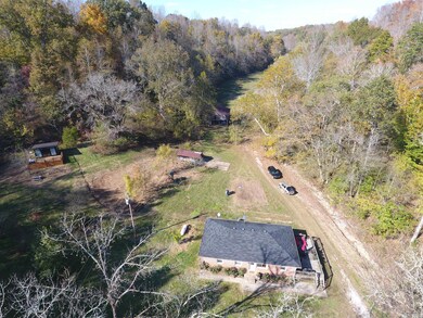 This farm consists of a home, barn, office, open fields, ringed by woods to create a private secluded retreat.