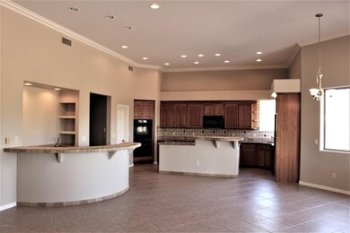 Great room looking back at kitchen