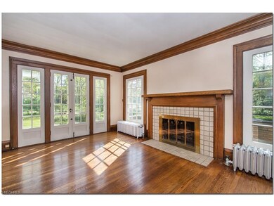The living room has inviting fireplace.