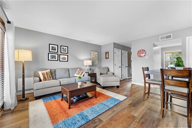 living/dining room with brand new flooring