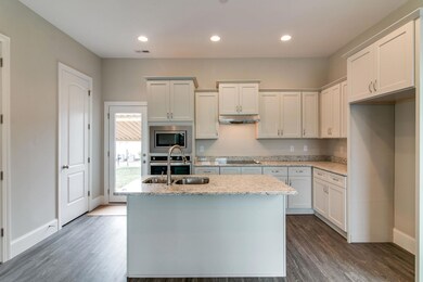 Photo is an example of builder's work. Actual home built may vary.