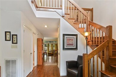 2 story entry way with beautiful tiered staircase 