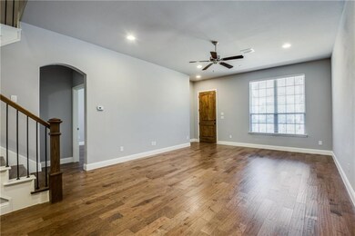 Lots of recessed lighting and stainless fixtures t