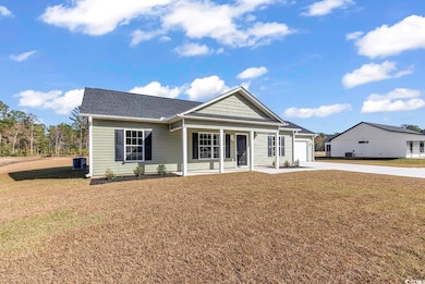 View of front of house featuring a front yard, a p