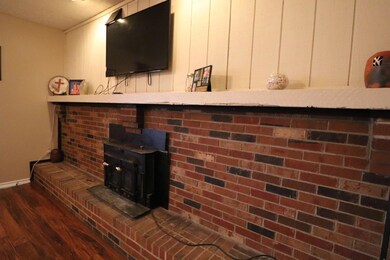 Woodburning fireplace with insert
