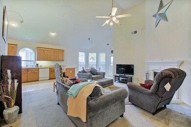 Living space opens to kitchen and dining space
