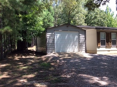 Holds a 16X22 bass boat and trailer
