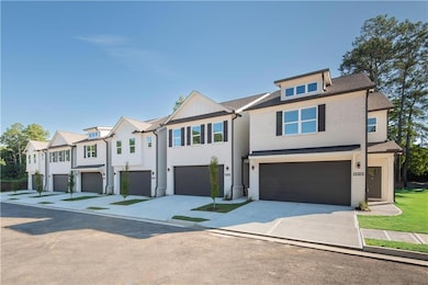 Modern inspired farmhouse with concrete driveway, a residential view, a shingled roof, and an attached garage