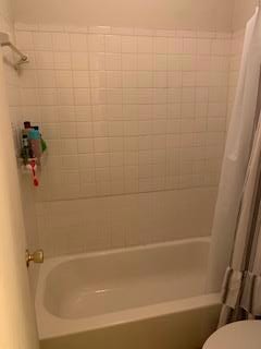 Full bath featuring shower / bathtub combination 