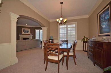 Large formal dining room with fluted colums
