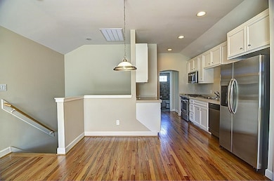 This photo showcases a modern kitchen with stainle