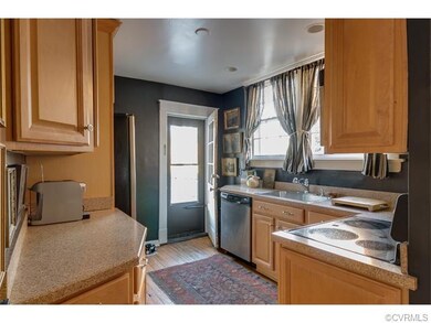Updated Kitchen has hardwood floors and lots of light.