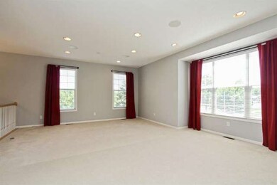 Grand living room, huge windows, attached 1/2 bath