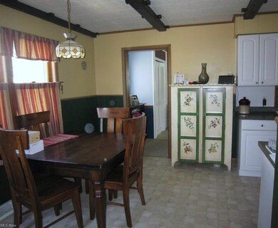 Eat-in kitchen has it's own entrance from the fron