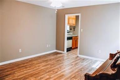 Large separate living room with NEW FLOORING!