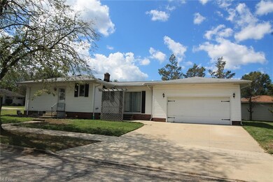 TWO CAR ATTACHED GARAGE AND NEWER CONCRETE