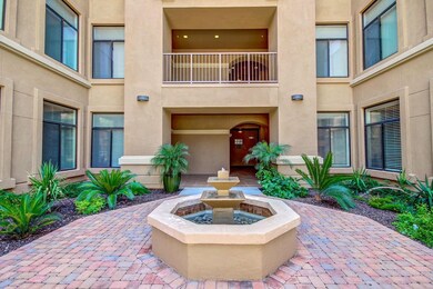 Lush Courtyard Entry with Fountain