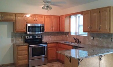 525 S Huntsman Blvd, Raymore, MO 64083 - photo 2