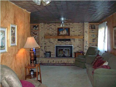 Living room with wood fireplace