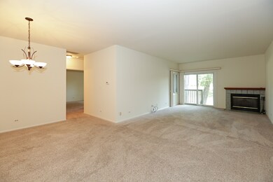 Features Fireplace and Sliders to Covered DeckView