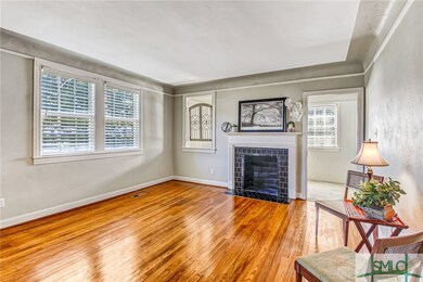 Living room looking east to enclosed porch