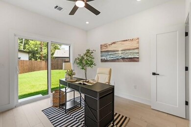 Office area with recessed lighting, light wood-type flooring, and a ceiling fan