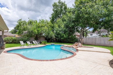 View as you enter the backyard from the driveway.