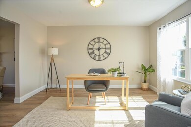To the right of the entry is a light and bright of