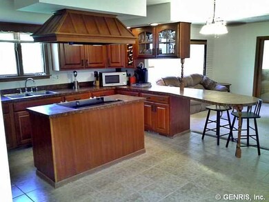 Kitchen. Extra large eat in kitchen with cook top 