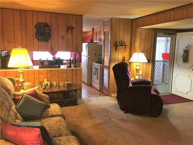 Living room is wider that normal due to the slideo