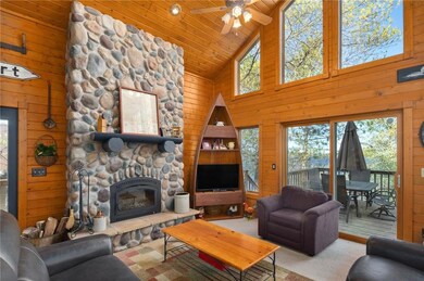 Great Room with floor to ceiling stone fireplace