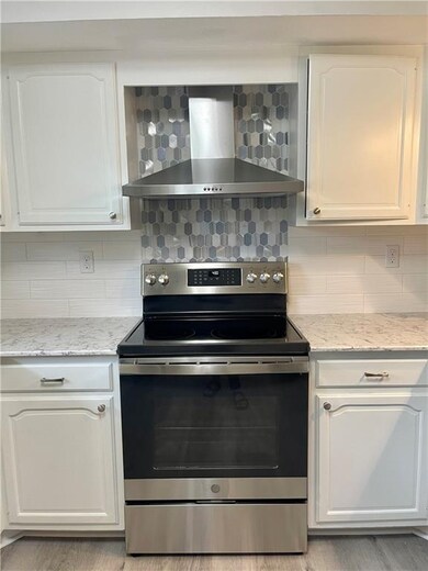 Subway tile and glass backsplash