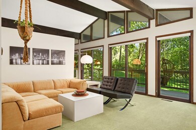 The vibe and views from this main level living room are incredible.