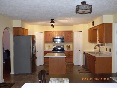 Eat in kitchen with plenty of space.  Walk out ont
